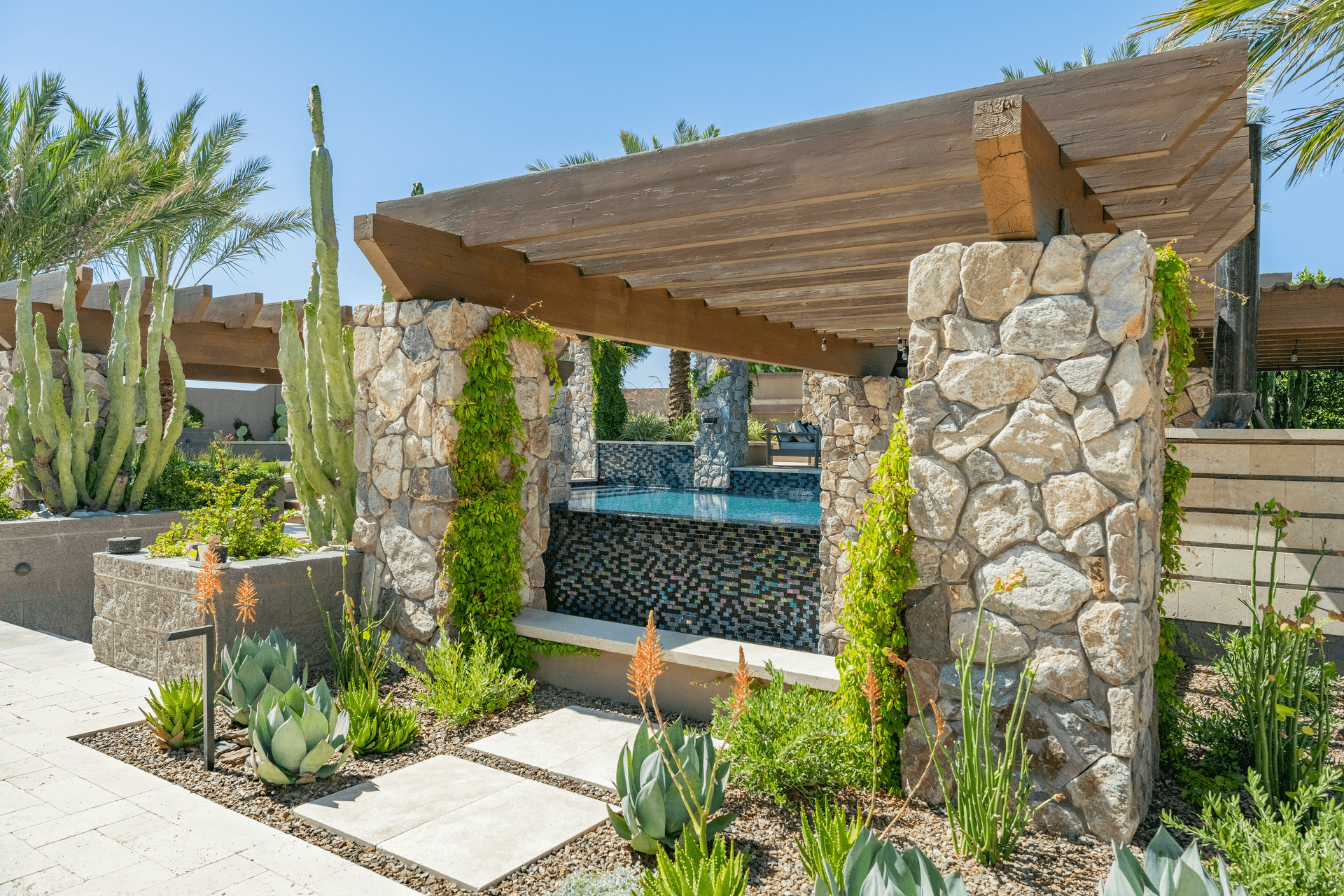 A beautiful modern patio with a water-conserving landscaping.